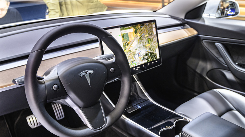 Tesla driver charged with manslaughter for Texas crash that killed a woman in her home
