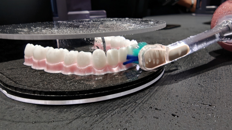 I flossed fake teeth with Dyson’s tech-riddled CameraJet toothbrush