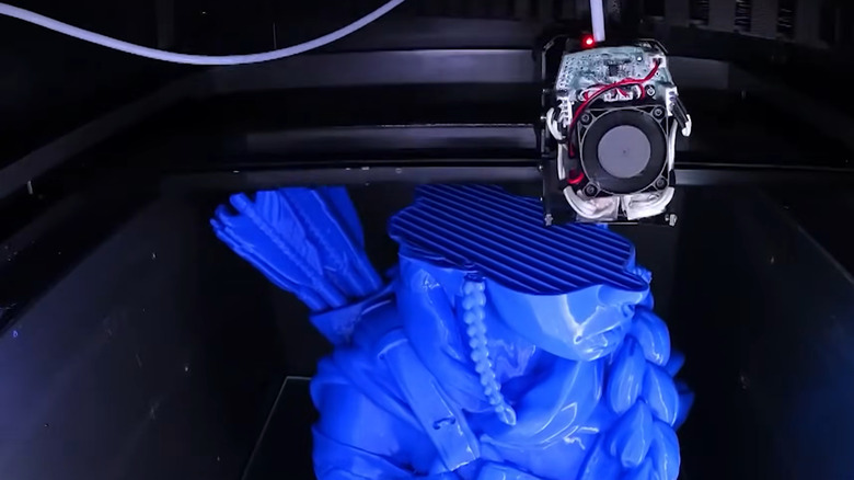 What does FDM stand for in 3D printing and how does it work?